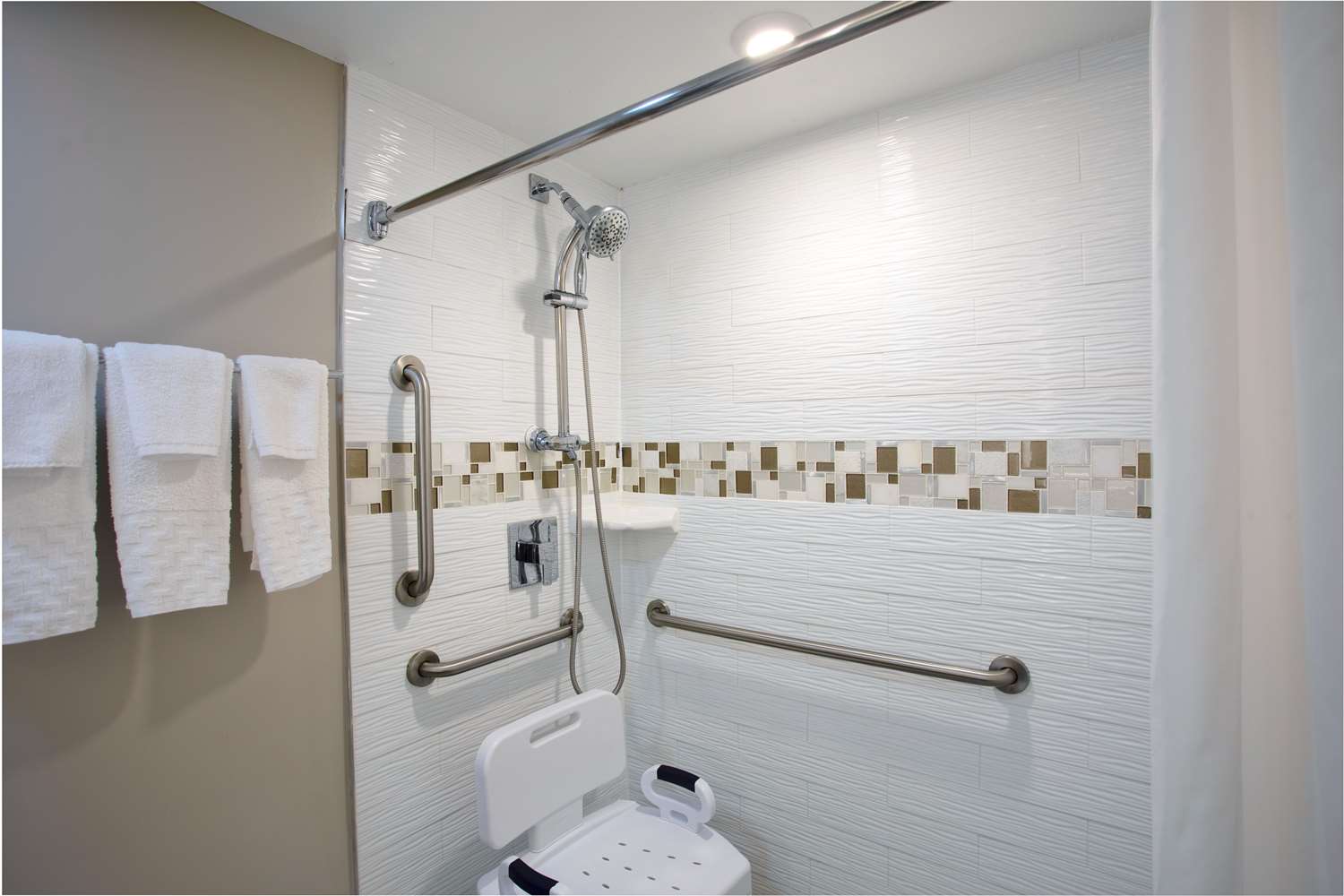 Photo contest finalist. Simple and stunning shower design featuring LUXE  Tile Insert Linear Drain.