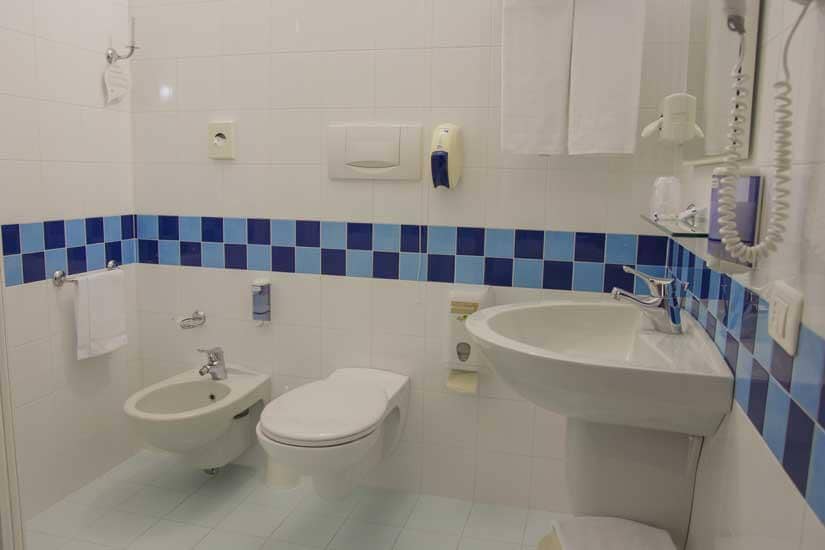 Bathroom - small but adequate with Disco lights - Picture of Albert's  Hotel, Paris - Tripadvisor